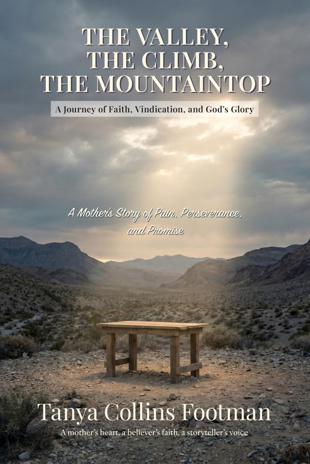 Desert landscape with a wooden bench and a book titled 'The Valley, The Climb, The Mountaintop' by Tanya Collins Footman.